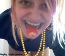 Hayley eats a strawberry